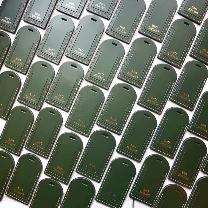 Custom luggage tags, green with gold text