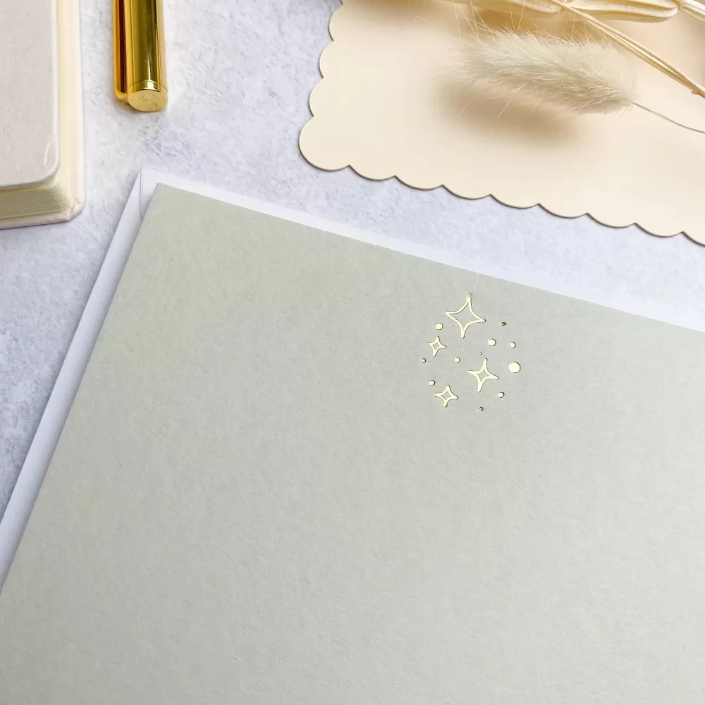 A6 grey notecards with a gold star design